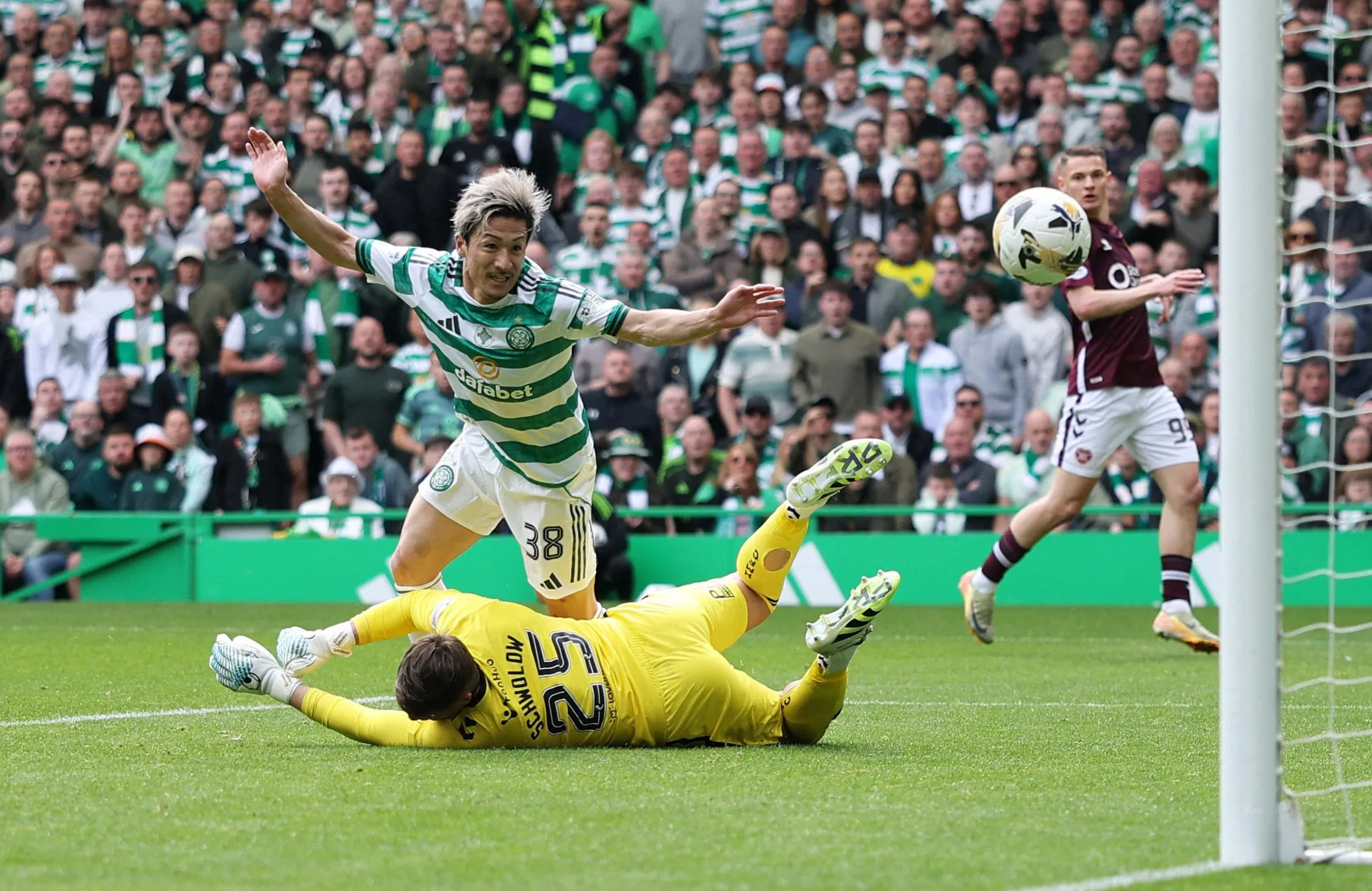 Daizen Maeda pounces to score Celtic’s second goal, which was awarded after a VAR check