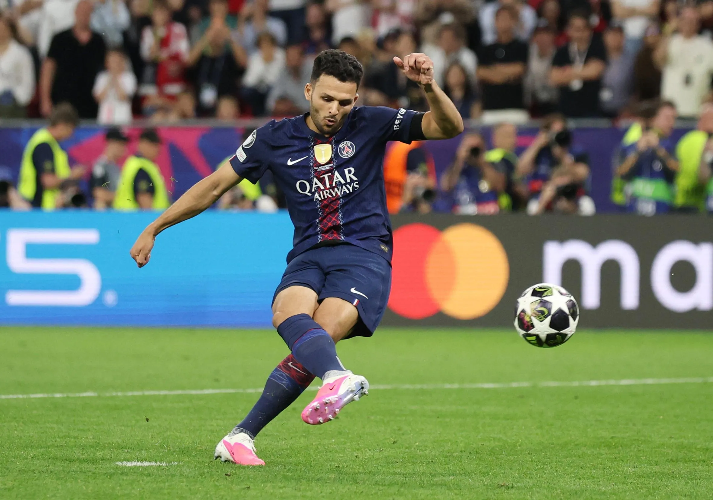 Paris St Germain's Goncalo Ramos scores a penalty during the shoot-out.
