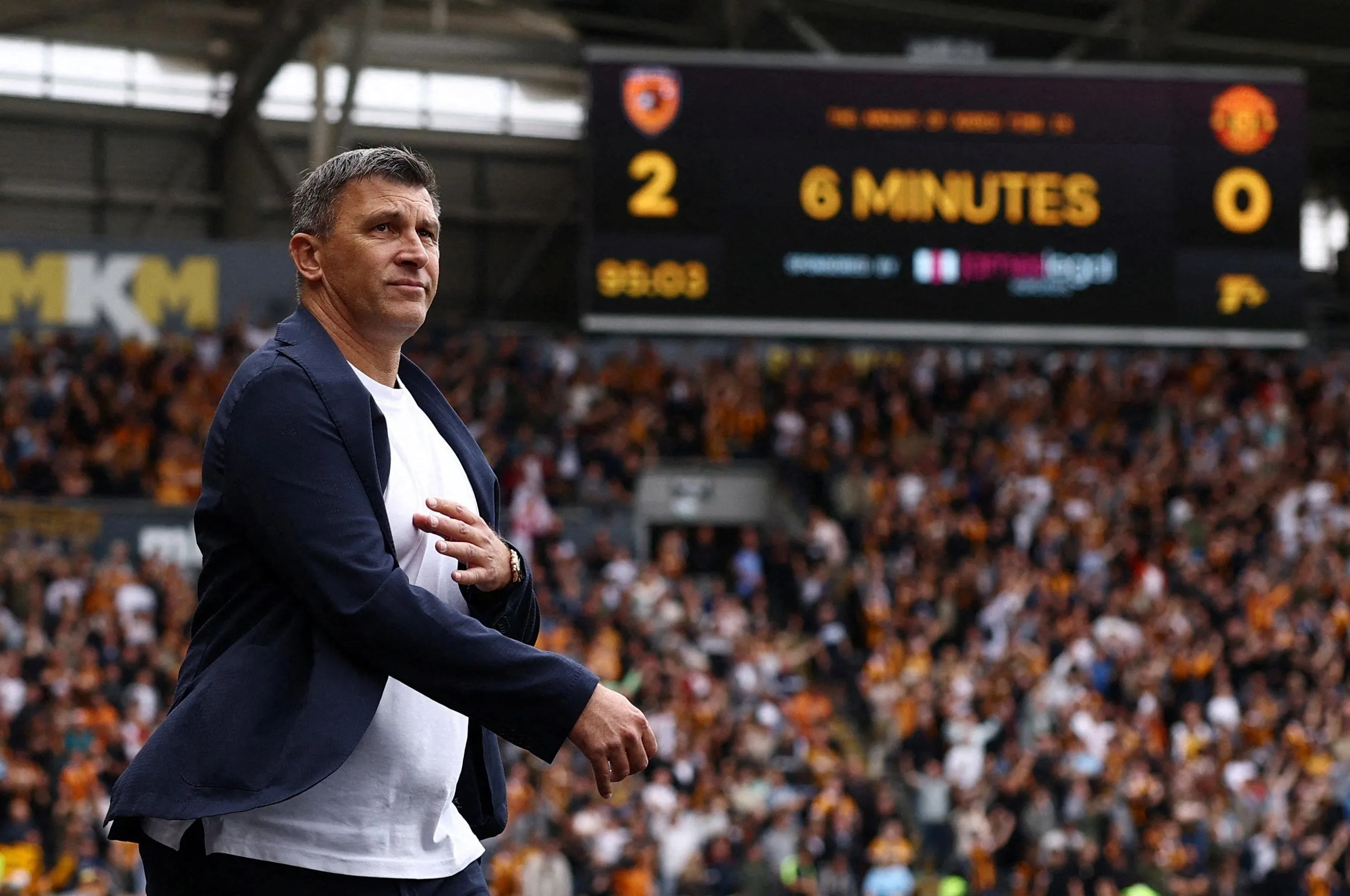 Hull City manager Sergej Jakirovic as the scoreboard is seen in the background