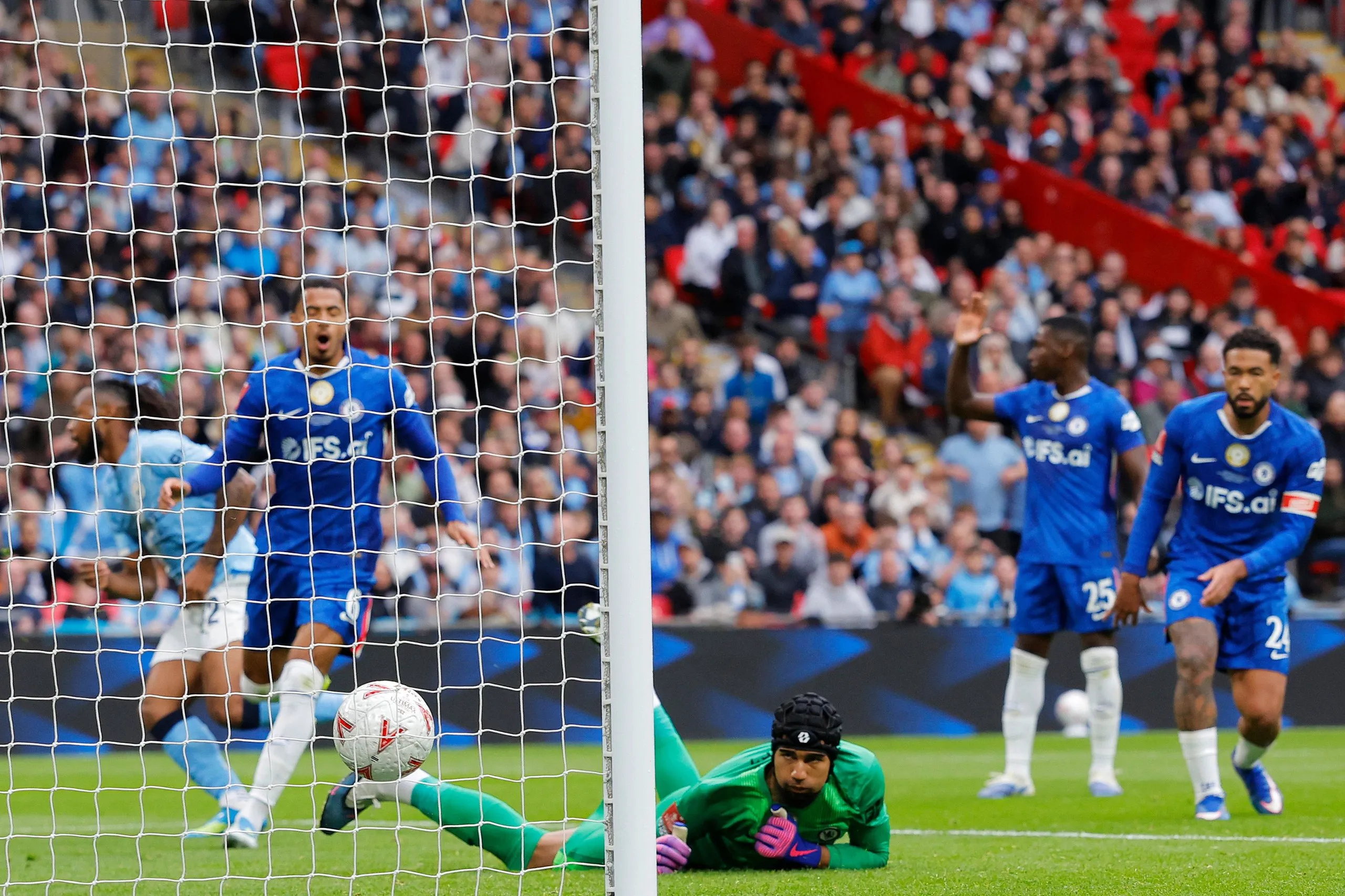 Chelsea keeper Robert Sanchez can only look as Antoine Semenyo’s flick goes into the net for Manchester City’s winning goal.