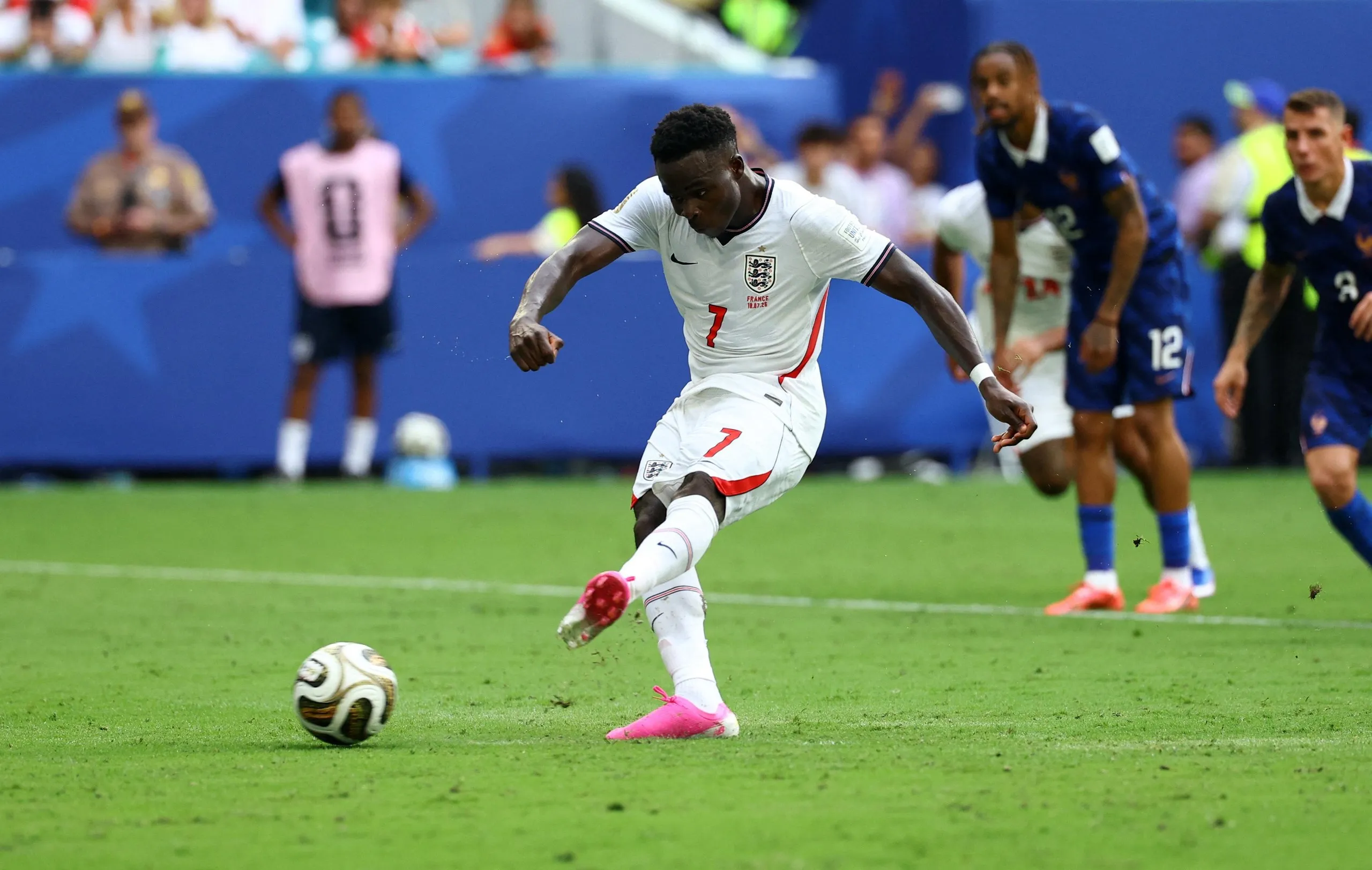 England's Bukayo Saka scores their fifth goal from the penalty spot to complete a hat-trick.