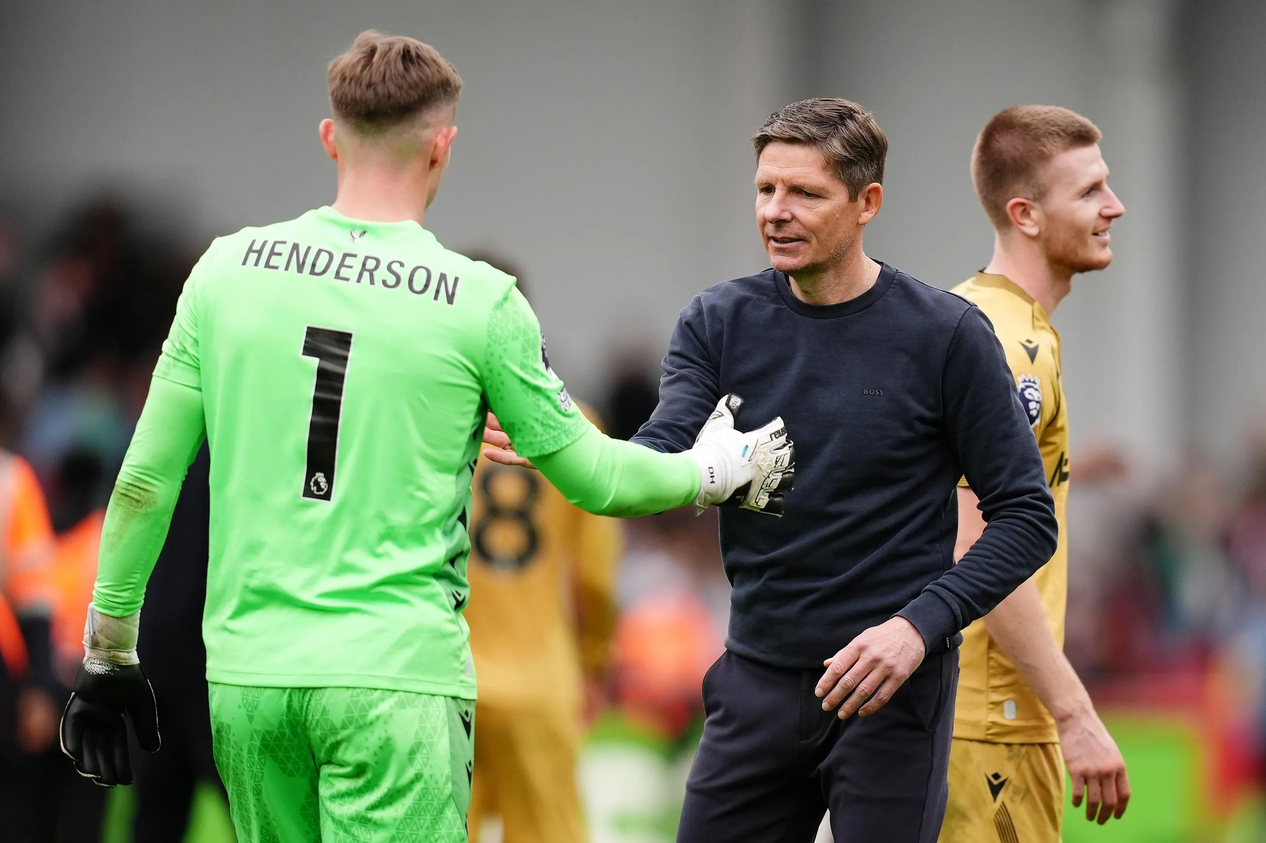 Dean Henderson and Oliver Glasner greet one another post-match
