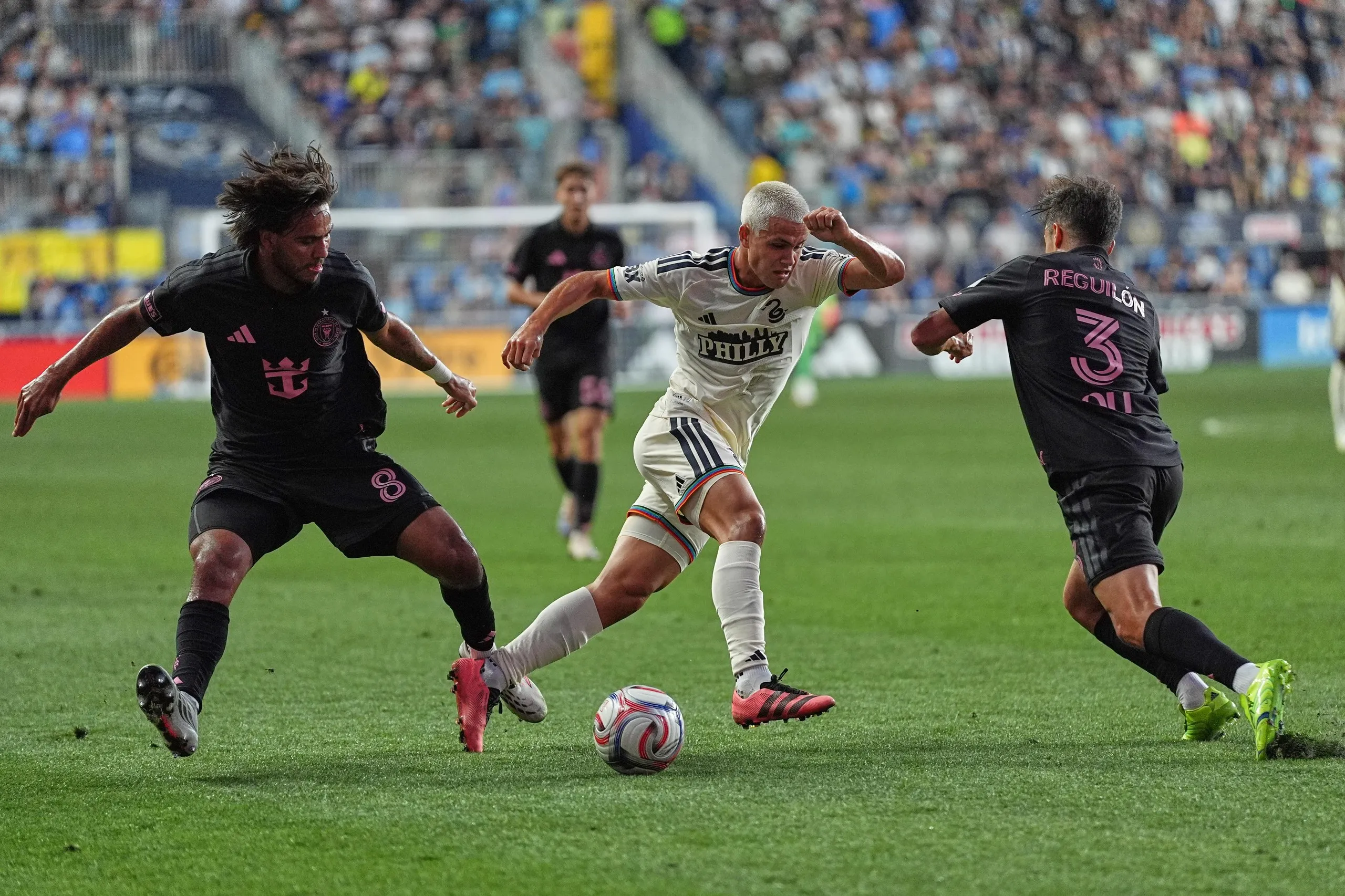 Cavan Sullivan makes a move against a pair of Inter Miami defenders.
