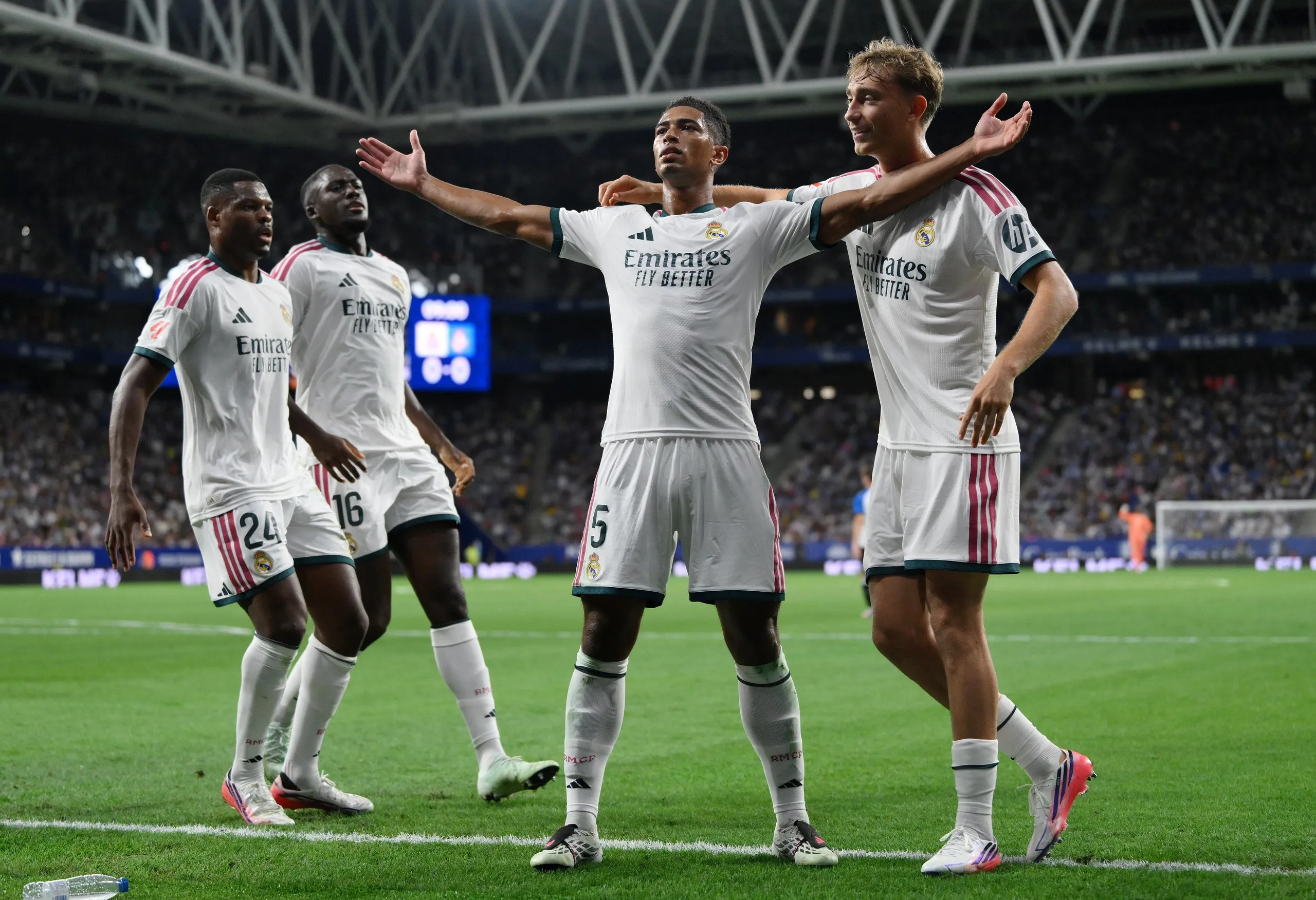 Jude Bellingham raises his arm in his trademark celebration after giving Real Madrid the lead