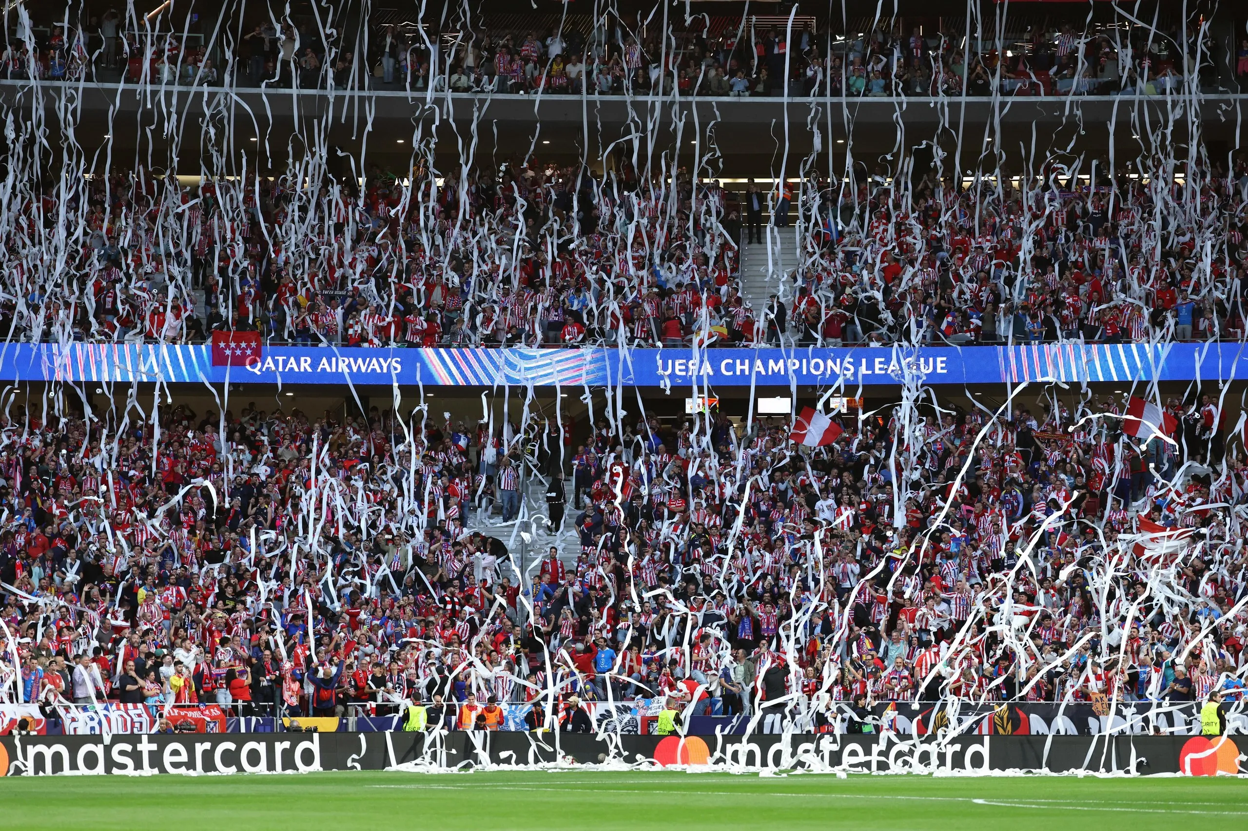 Atlético Madrid fans throw toilet paper before the Champions League semi-final first leg with Arsenal.