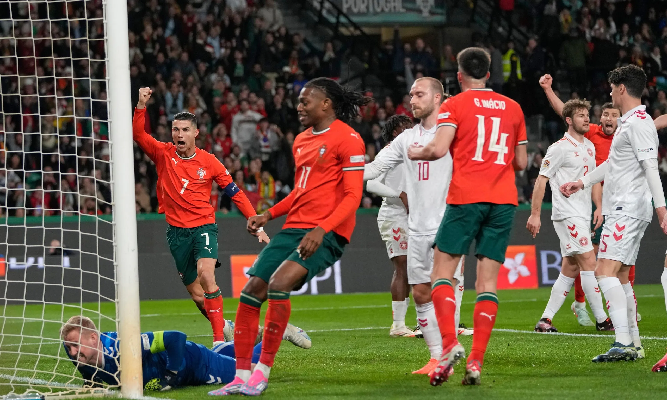 Delighted Roni:Cristiano Ronaldo celebrates after Denmark's Joachim Andersen scored an own goal.
