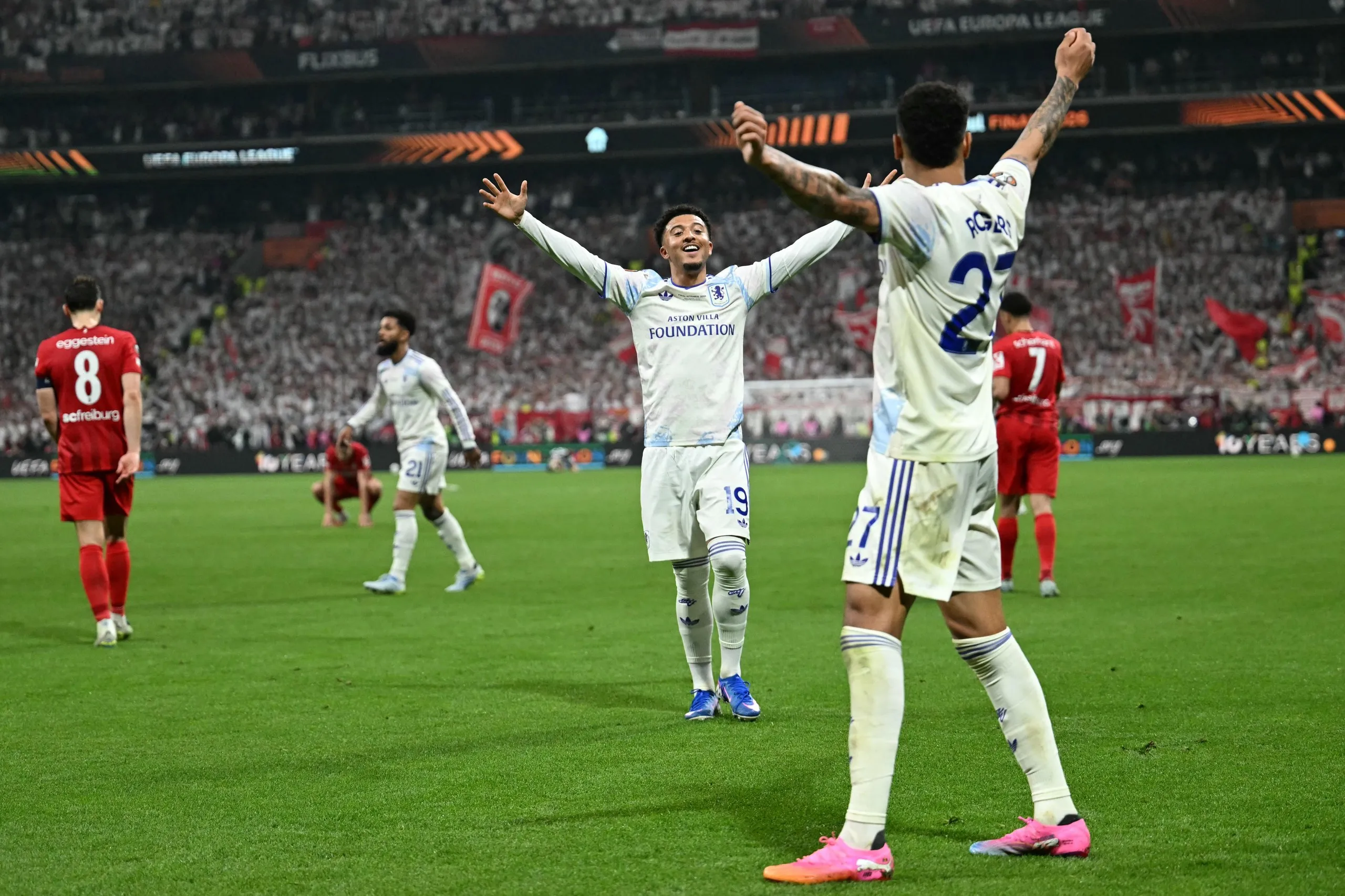 Aston Villa players celebrate after their win in the Europa League final soccer match between Freiburg and Aston Villa in Istanbul