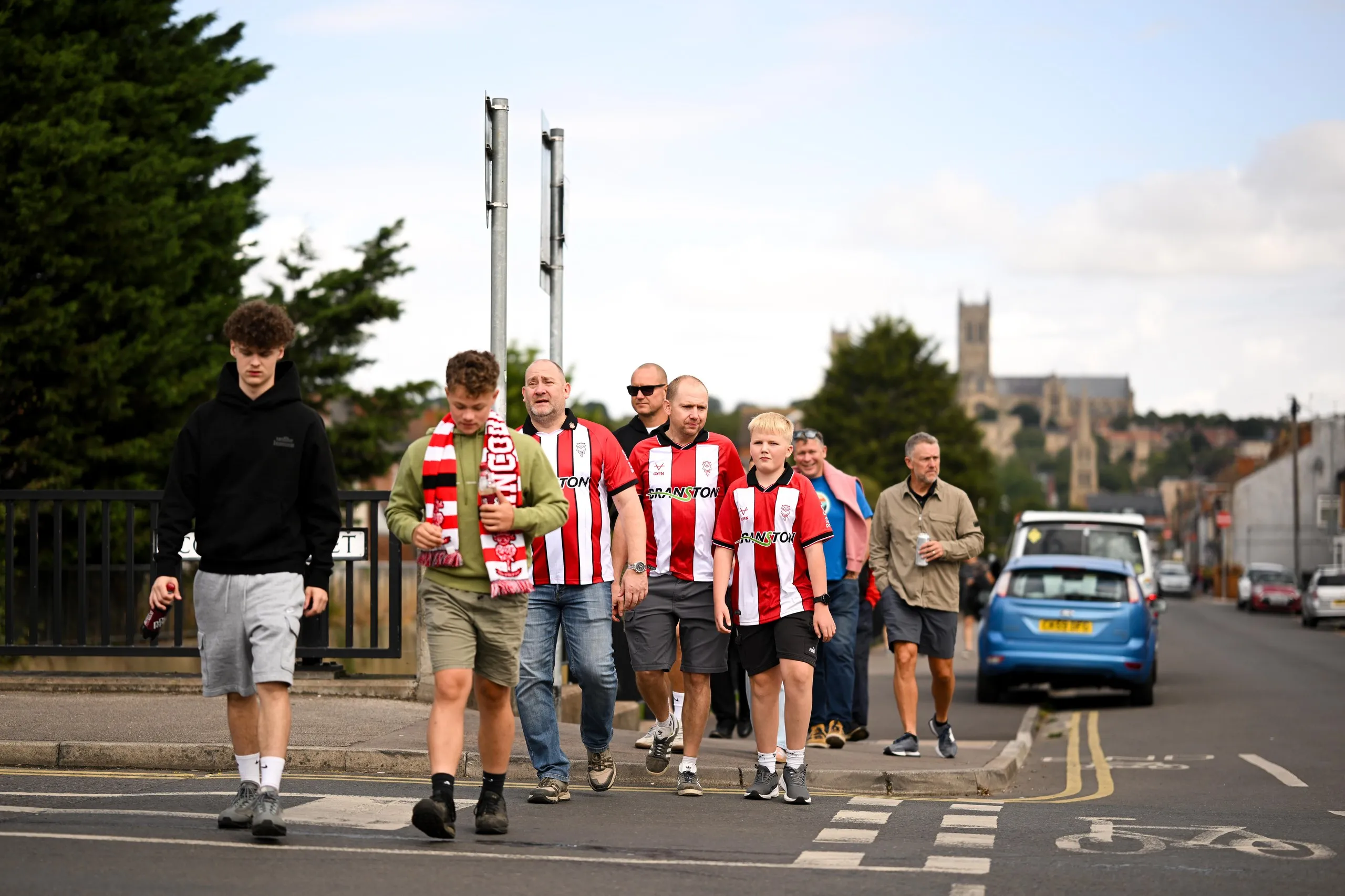 Lincoln City fans arrive for the Championship match against Portsmouth