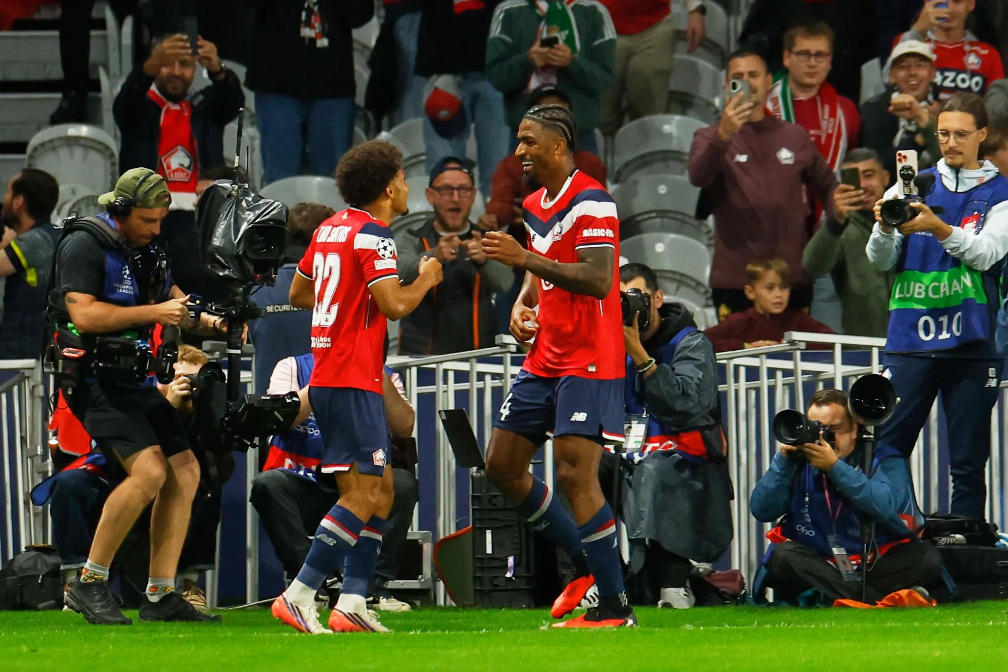 Alexsandro Ribeiro (right) celebrates with Tiago Santos after restoring Lille’s lead over Real Betis.
