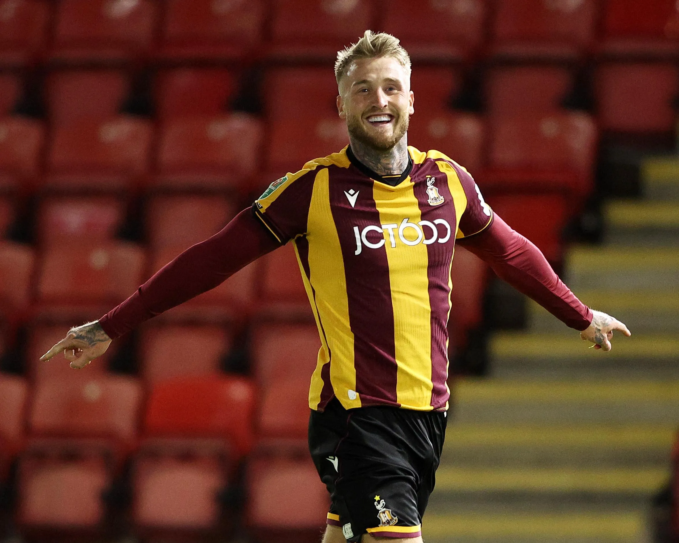 Stephen Humphrys celebrates after scoring Bradford City’s second goal at Orient.