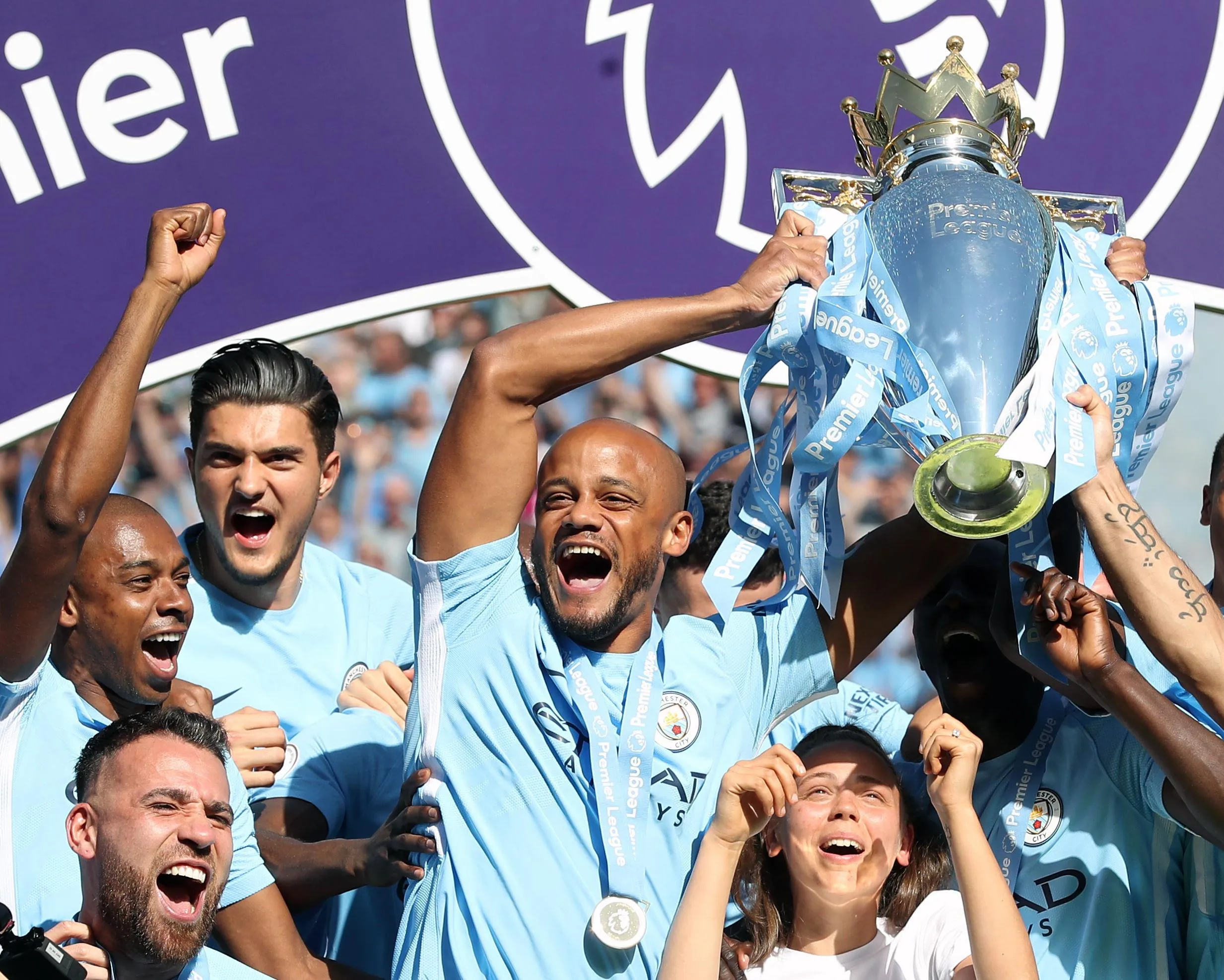 Vincent Kompany lifts the Premier League trophy as Manchester City win the title after beating Huddersfield Town at the Etihad Stadium, Manchester, 6 May 2018.