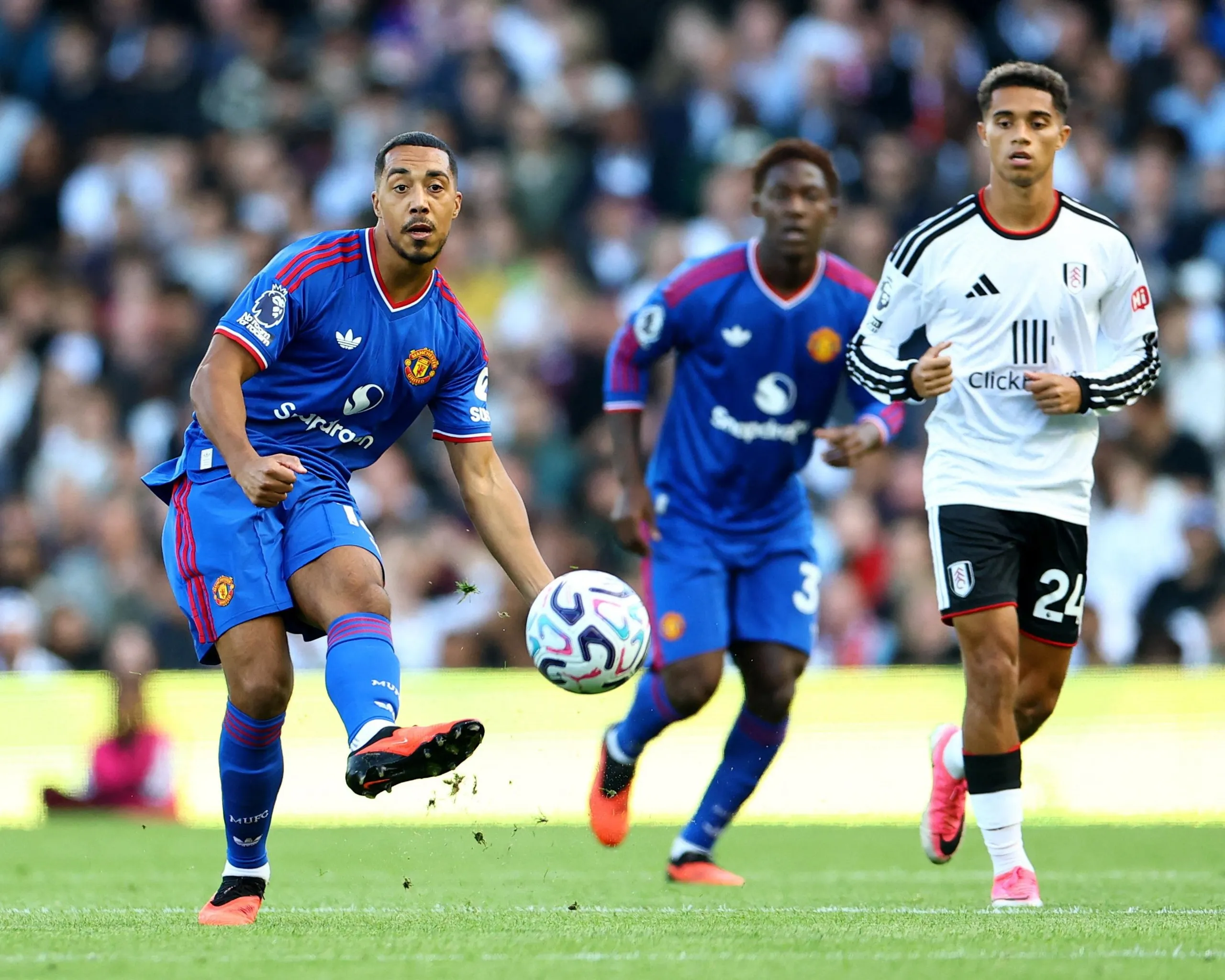 Tielemans in action with Fulham's King.