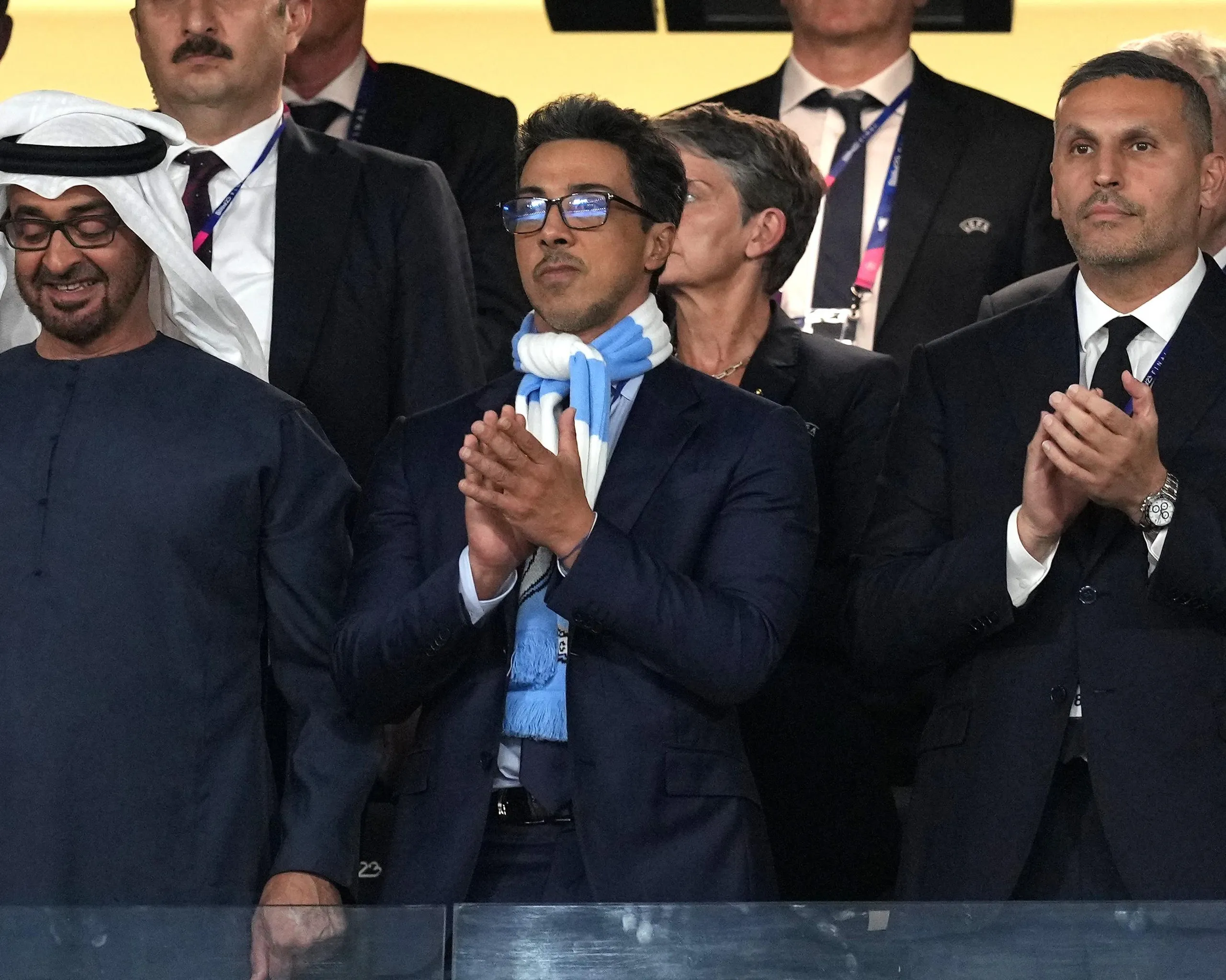 The Manchester City owner, Sheikh Mansour (centre), and chair, Khaldoon al-Mubarak (right), applaud from the directors’ box.