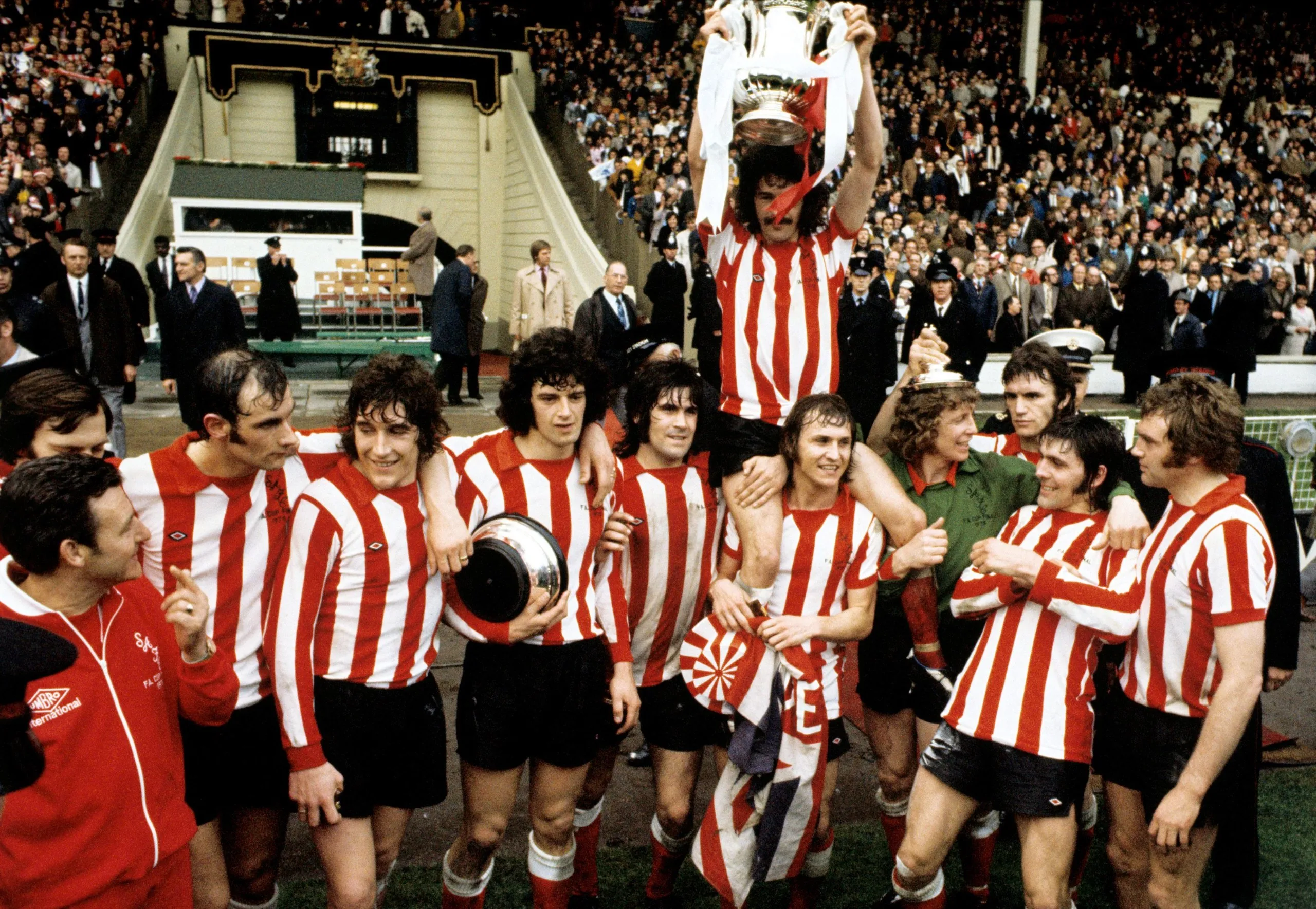 Sunderland's captain, Bobby Kerr, is held aloft by his teammates after their 1973 FA Cup final victory over Leeds