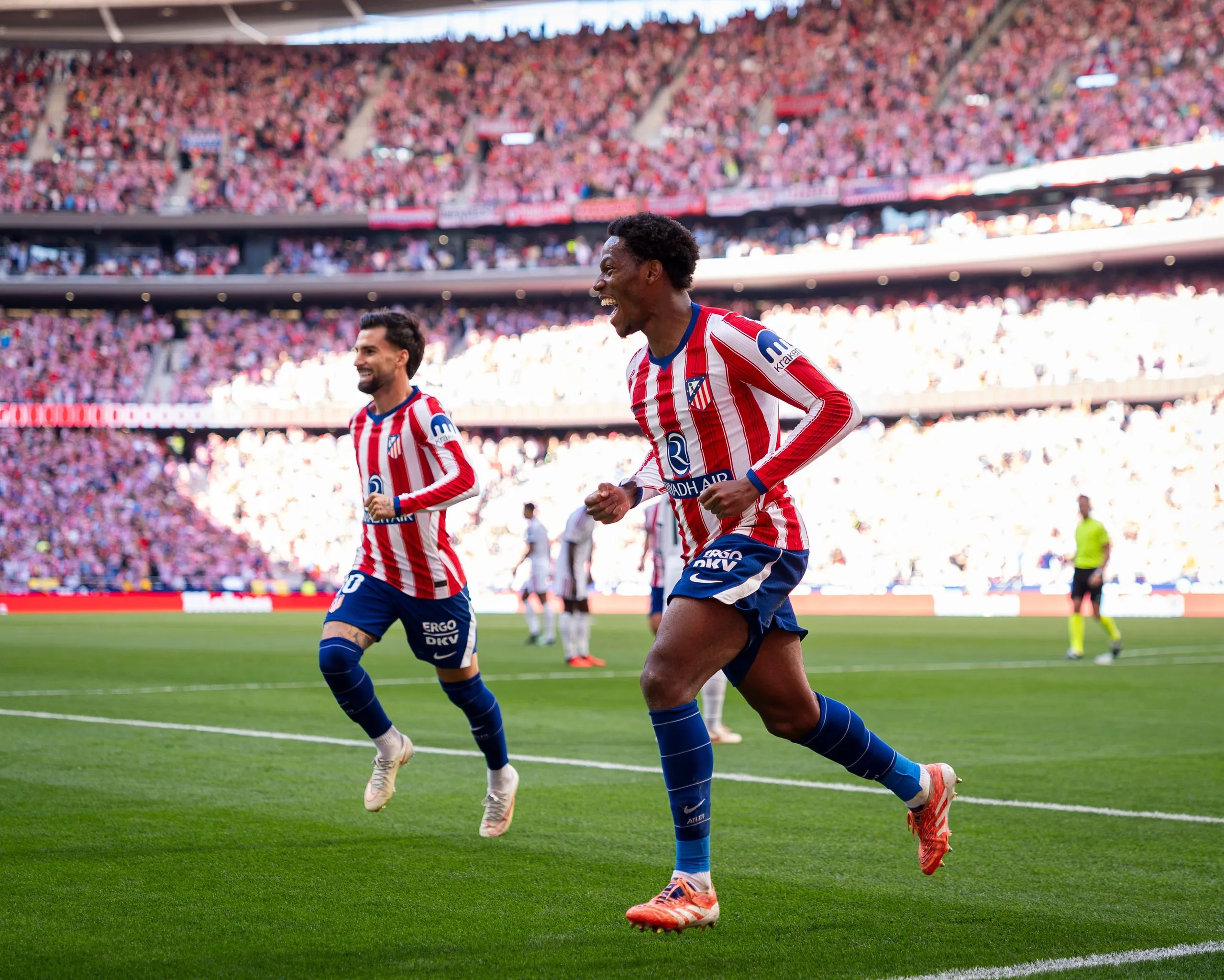 Alex Baena and Jonathan David celebrate during the Madrid derby