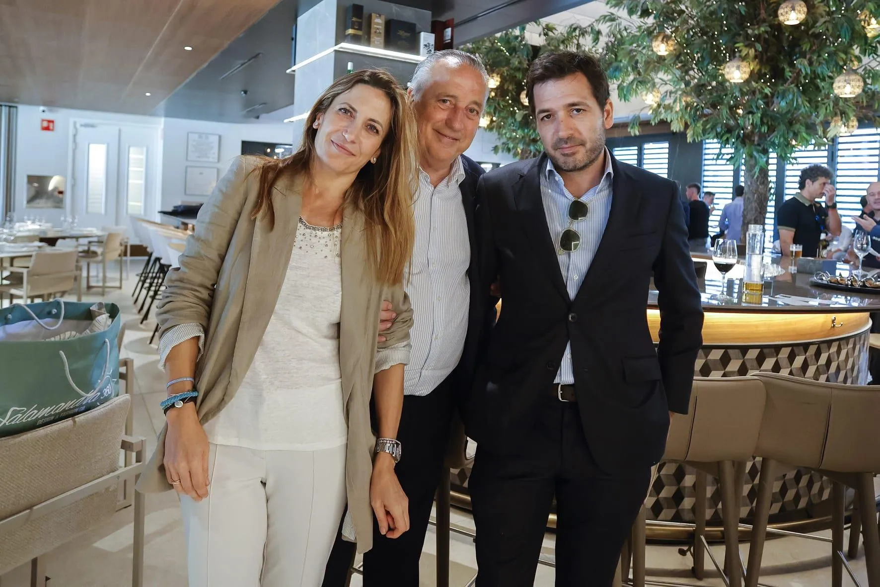 Fernando Roig standing between his daughter Elena and son Fernando