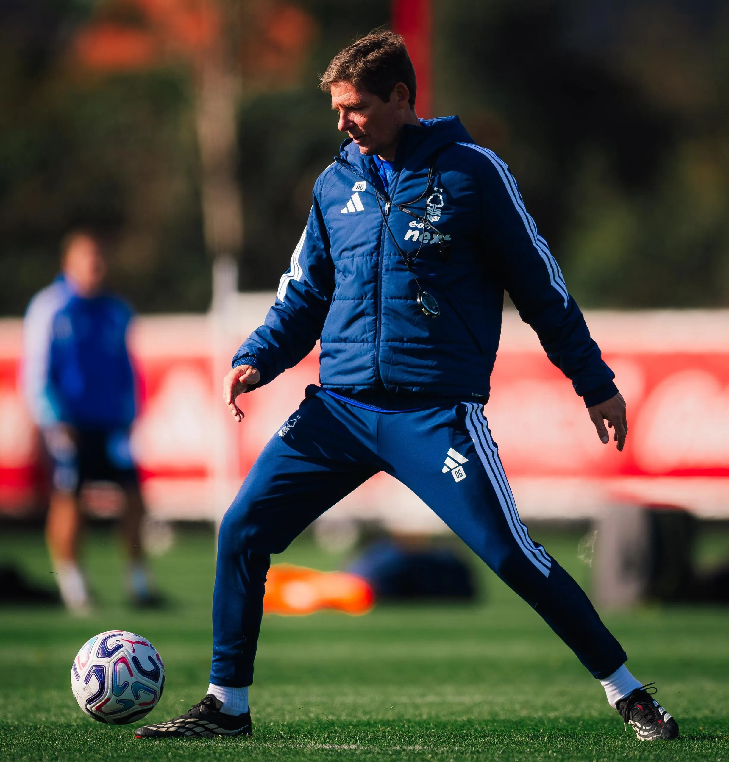 Oliver Glasner controls the ball during training