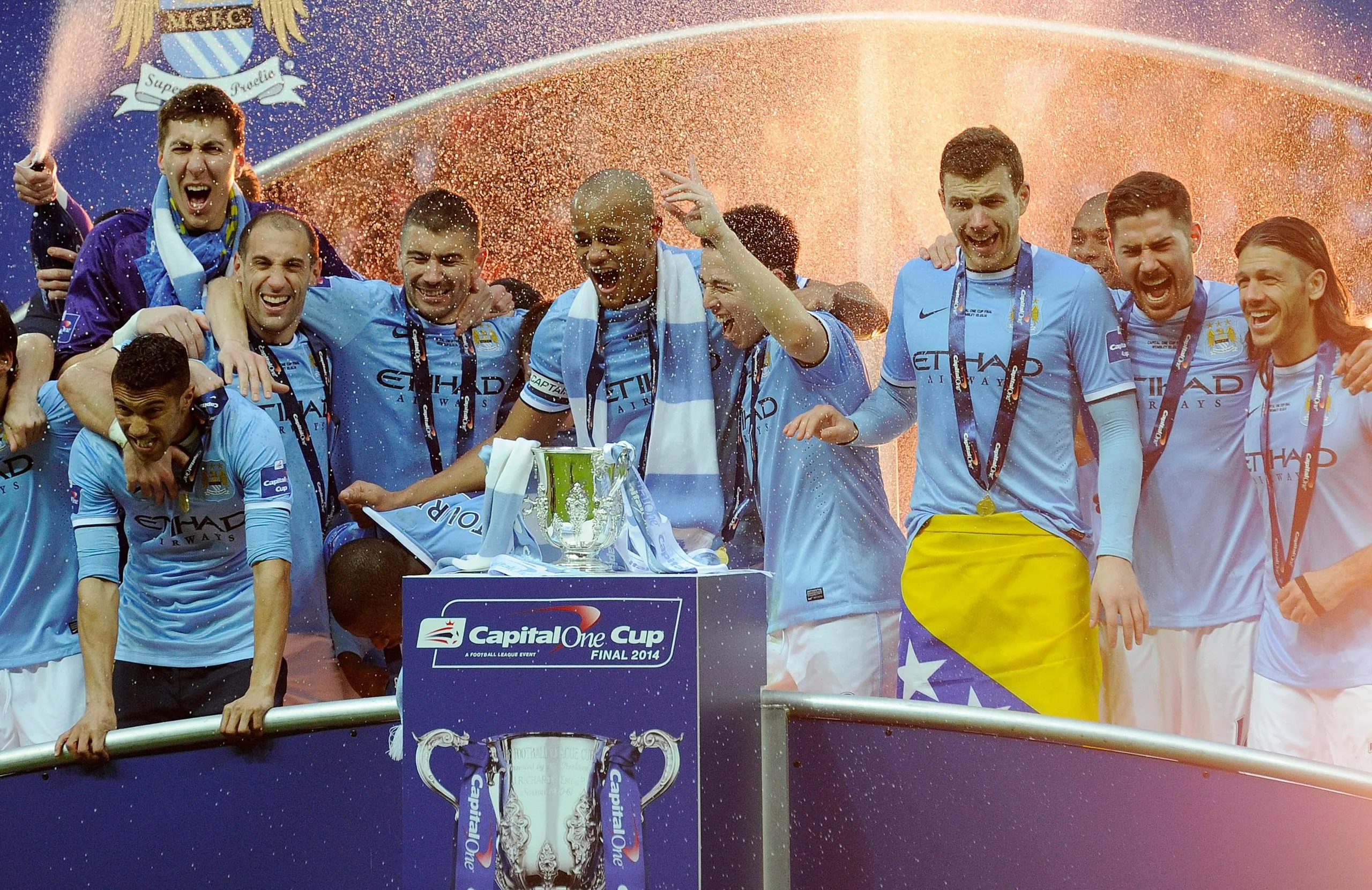 Manchester City celebrate with the League Cup in 2014
