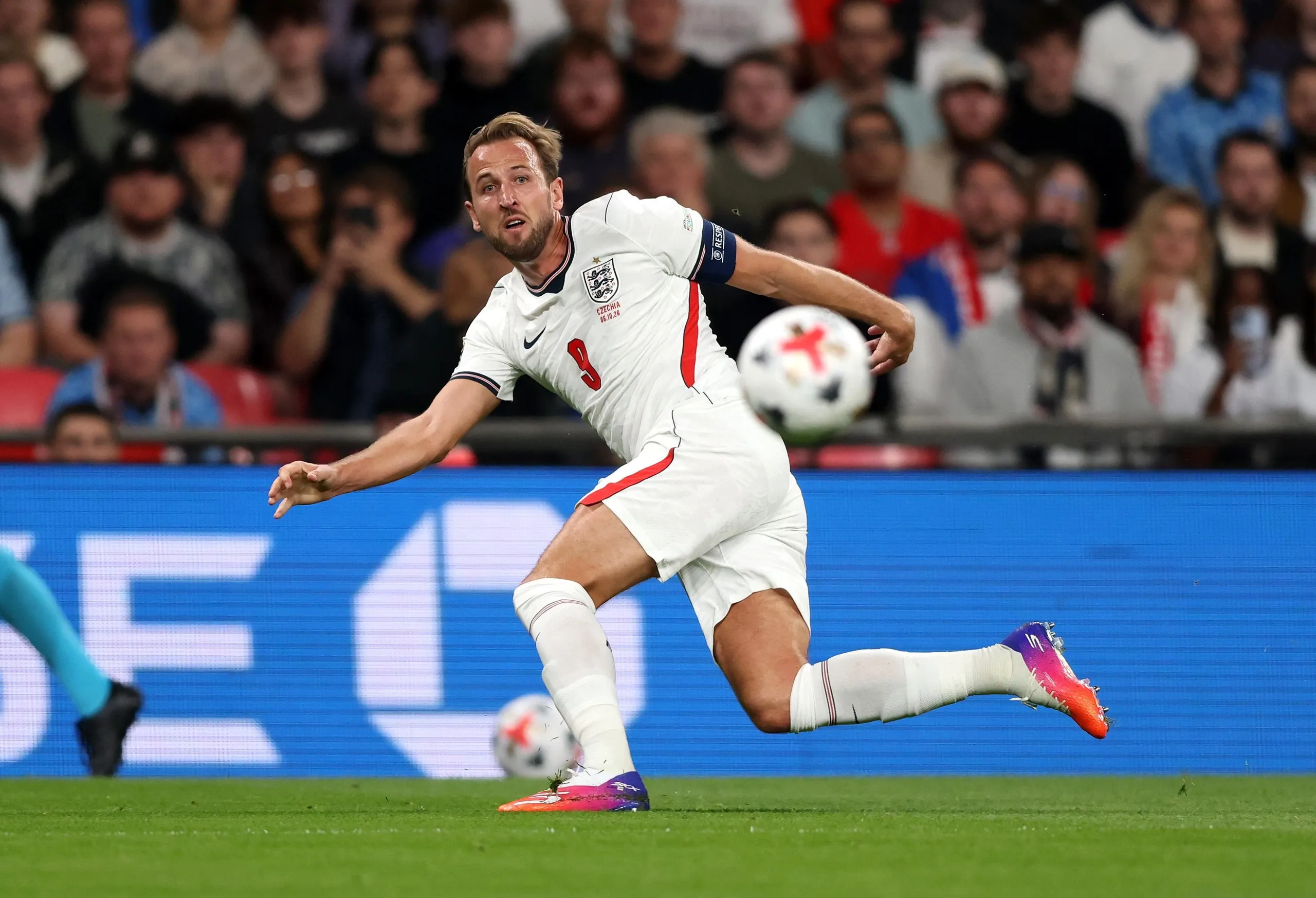Harry Kane crosses the ball in the buildup to England’s opener