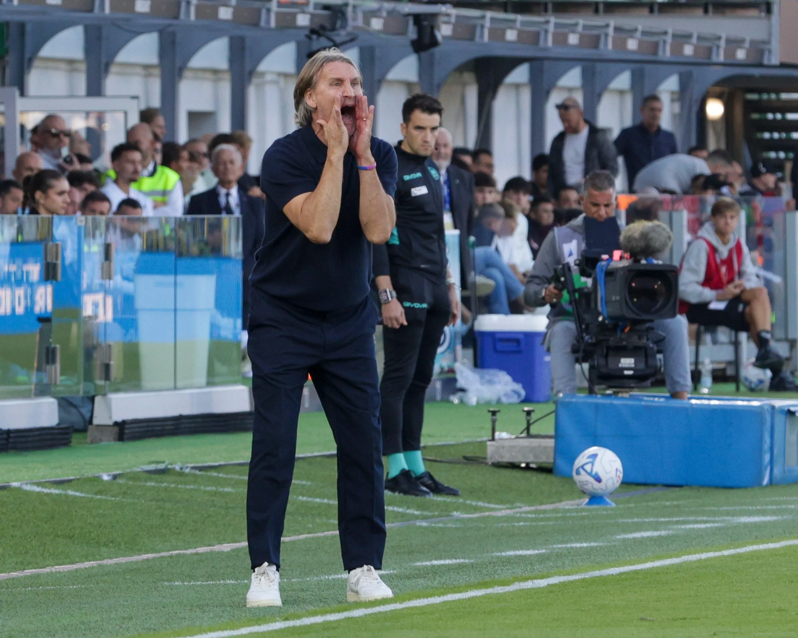 Venezia coach, Davide Nicola, issues instructions to his players