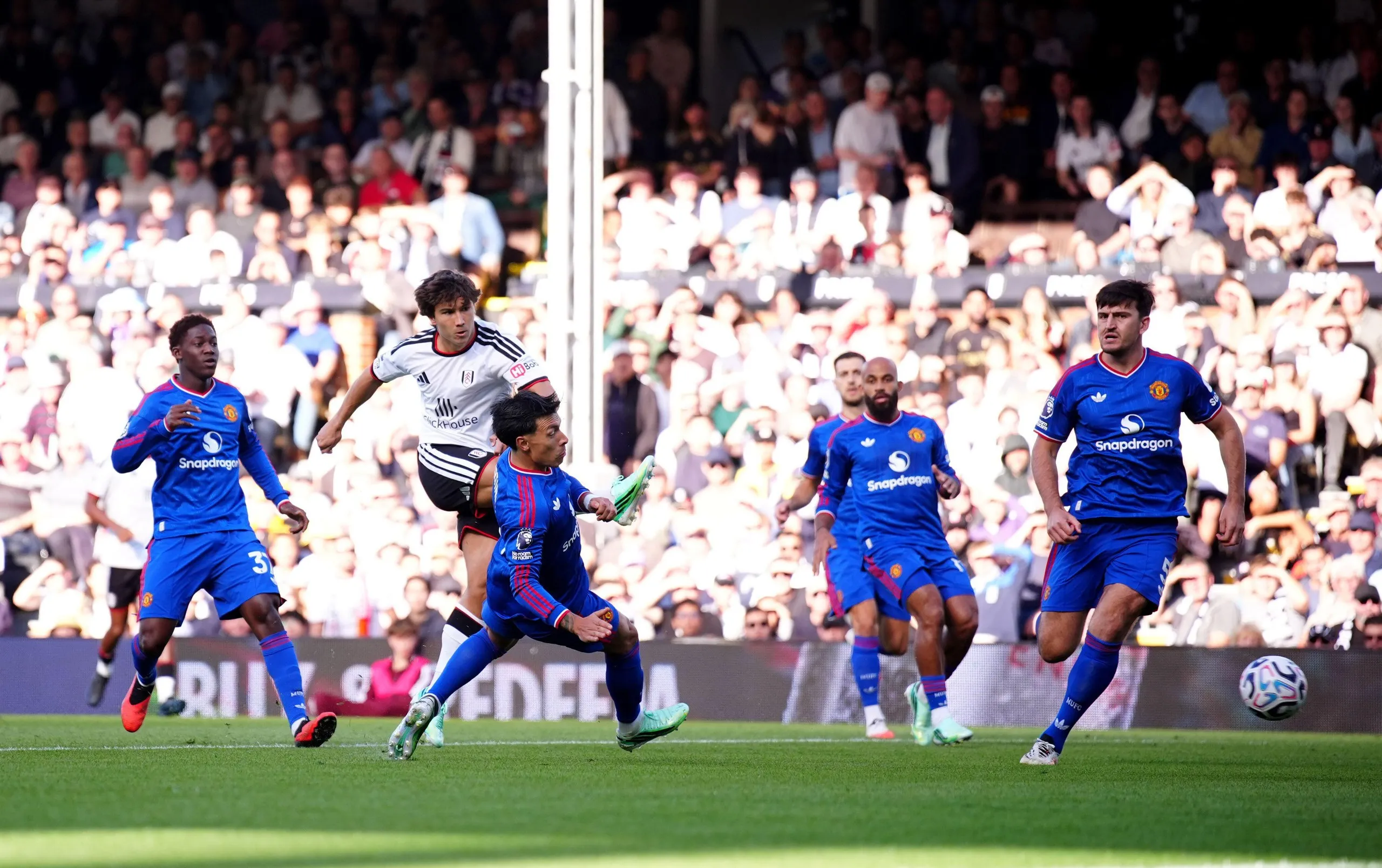Fulham’s Gonzalo García (second left) attempts a shot on goal against Manchester United.