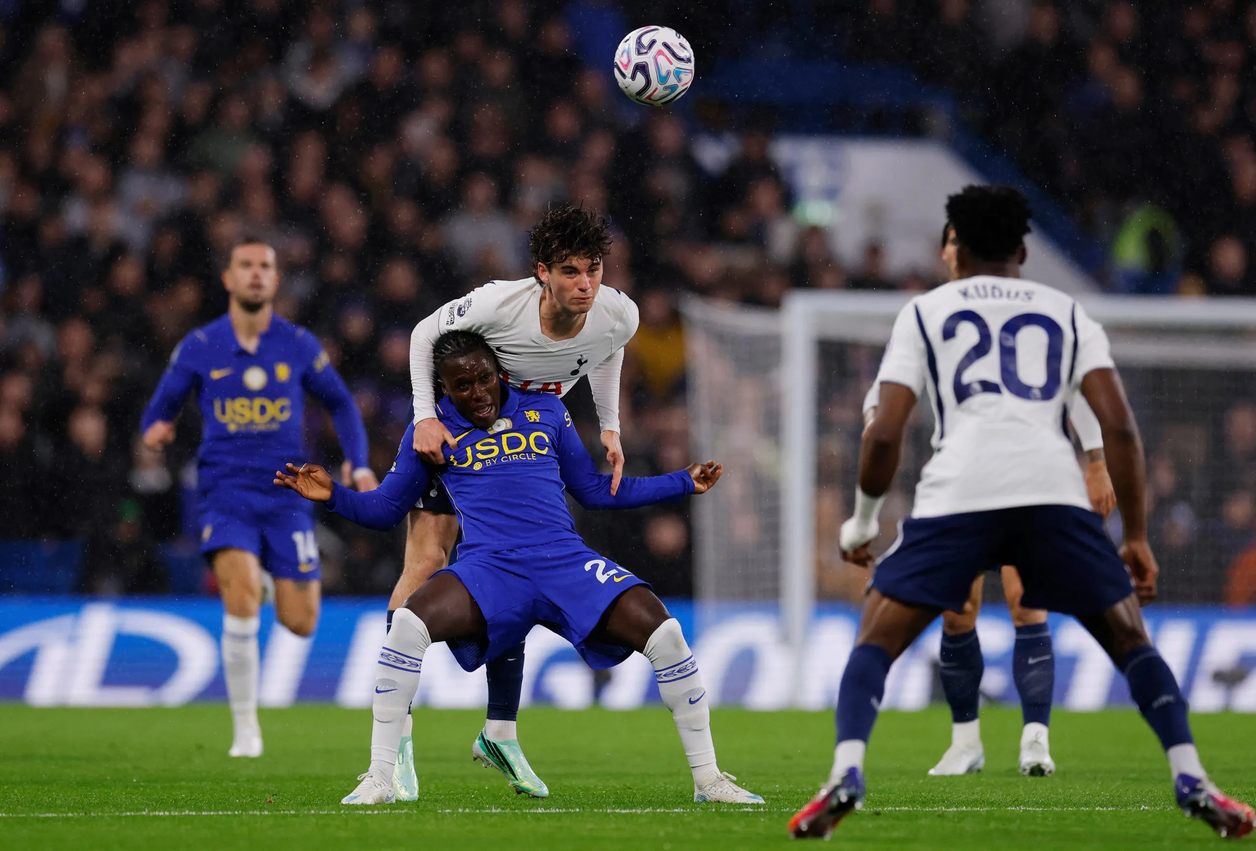 Chelsea's Geovany Quenda and Tottenham's Archie Gray challenge for a header