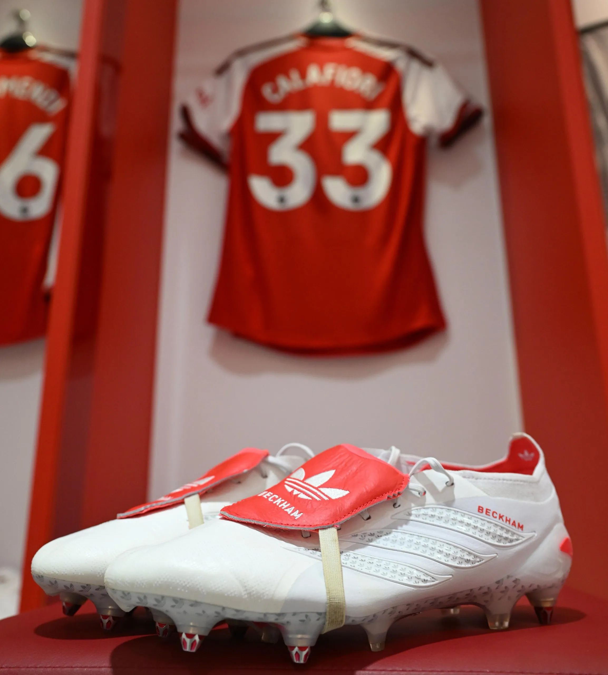 Riccardo Calafiori’s No33 shirt and boots laid out in the Arsenal dressing-room. 