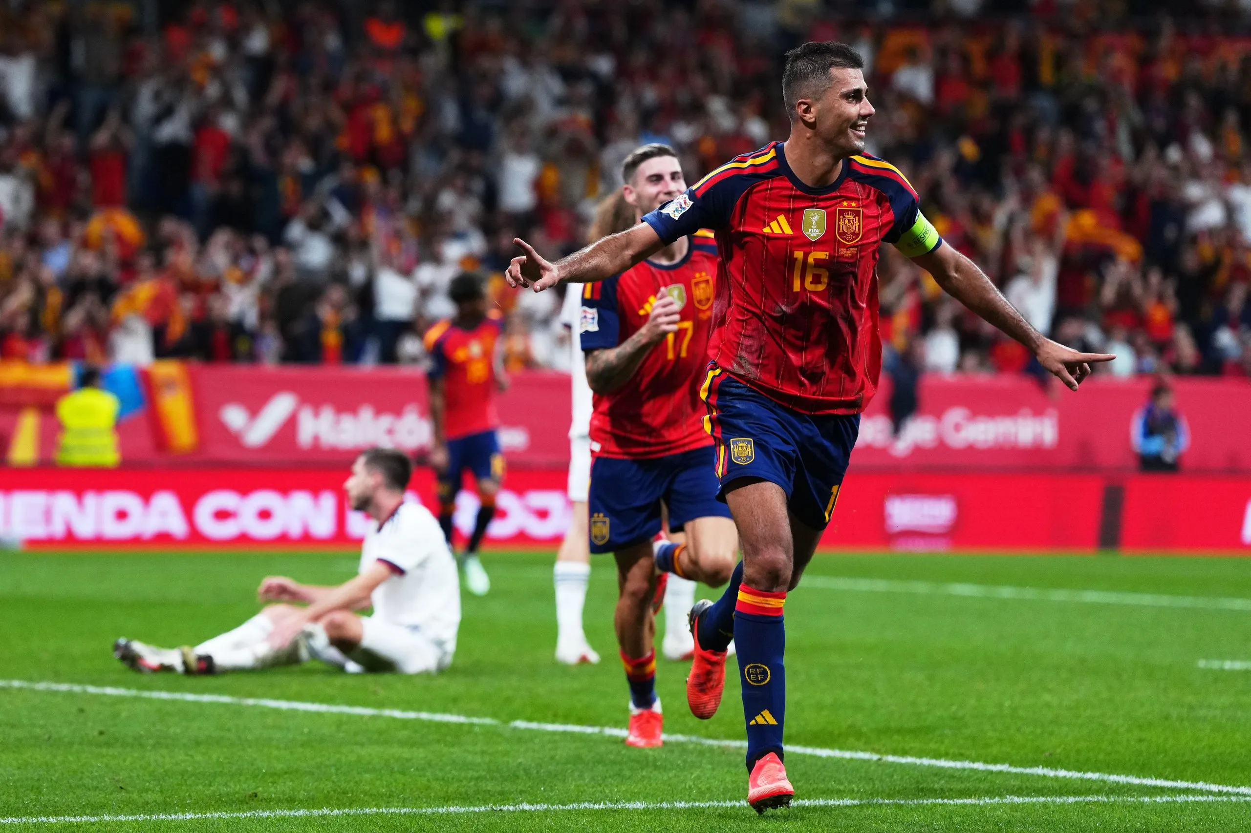 Rodri reacts after scoring Spain’s second in Oviedo